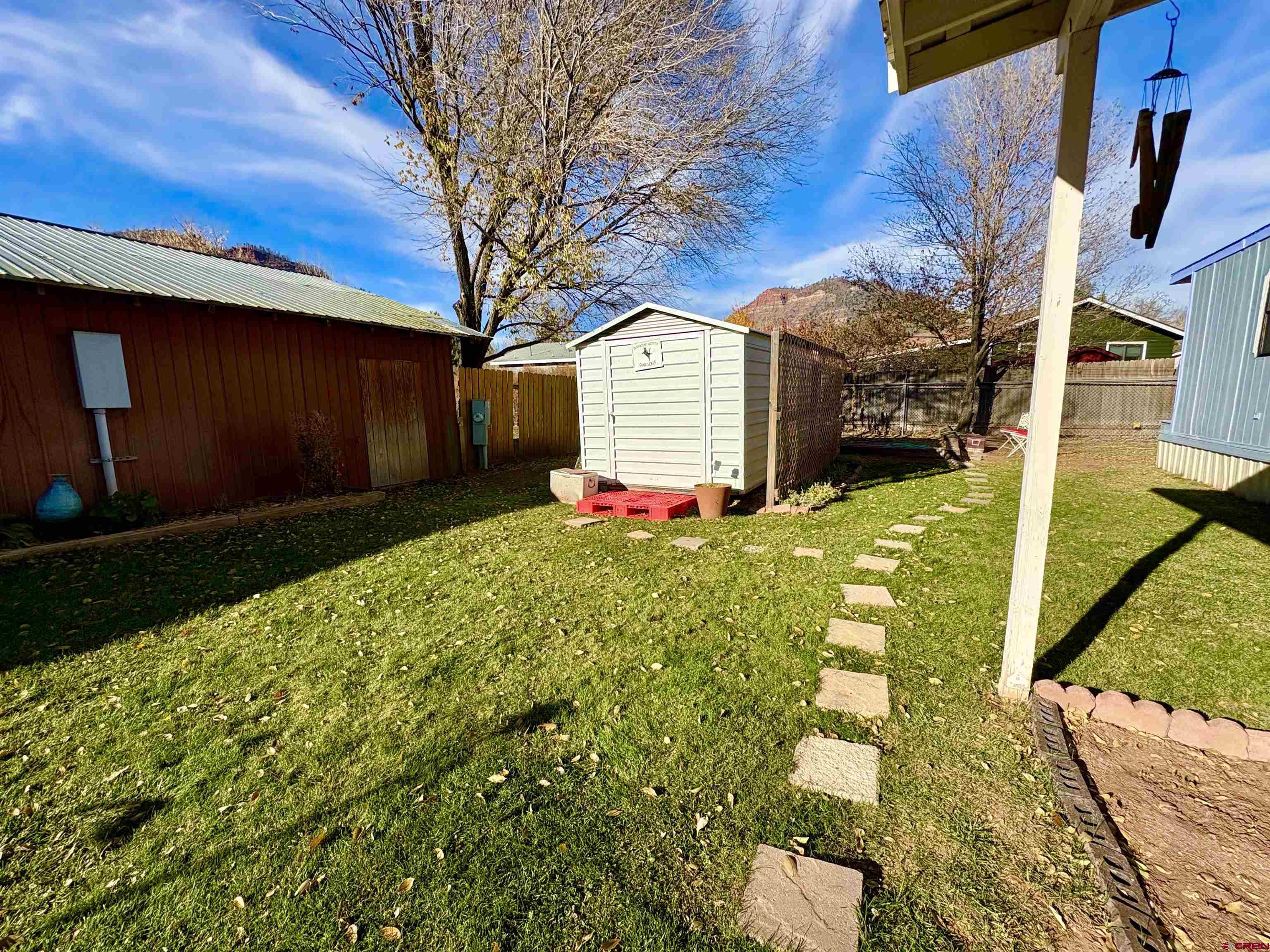 3 Lomas Drive Durango, CO 81301 - Photo 23 of 26 a front view of a house with garden