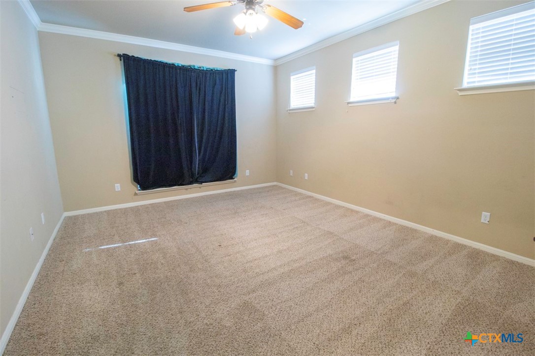 7022 Valley Mist Drive Temple, TX 76502 - Photo 22 of 36 an empty room with windows