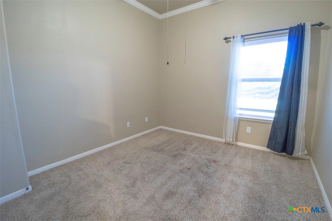 7022 Valley Mist Drive Temple, TX 76502 - Photo 25 of 36 a view of an empty room and a window