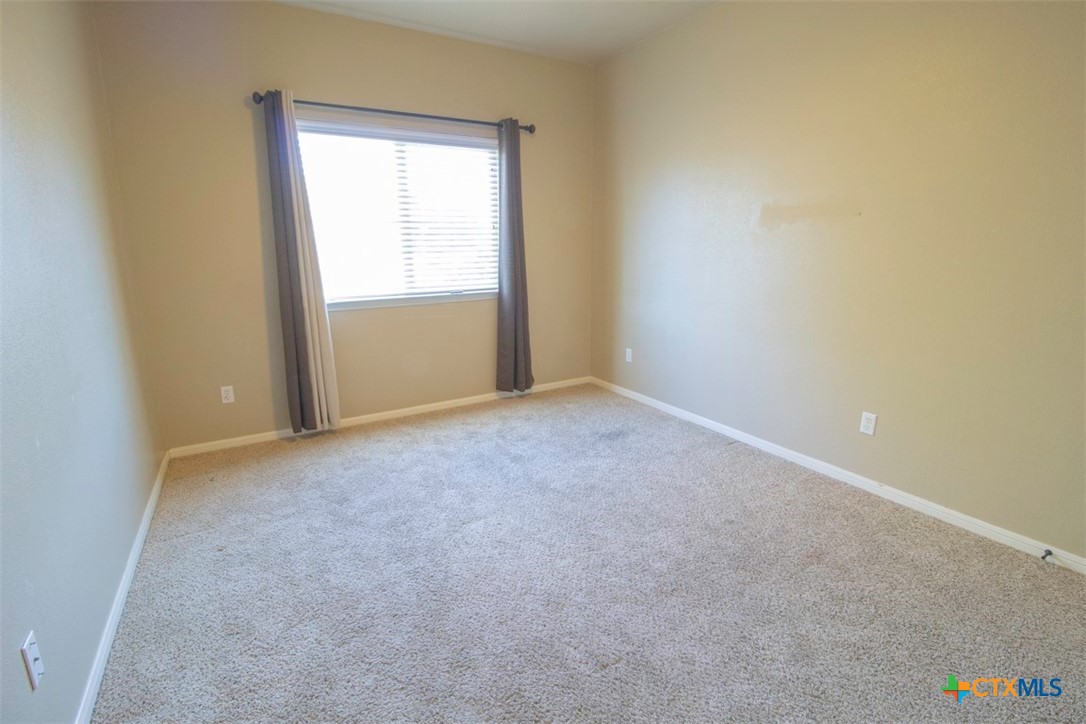 7022 Valley Mist Drive Temple, TX 76502 - Photo 30 of 36 a view of an empty room with a window