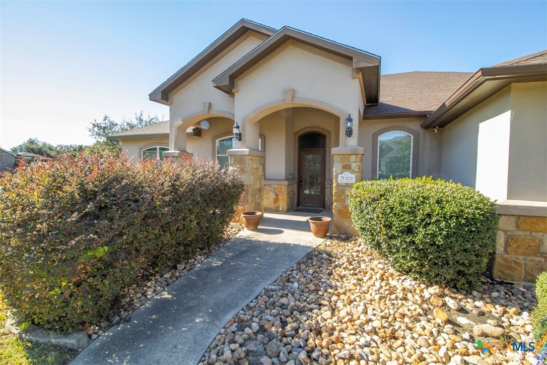 7022 Valley Mist Drive Temple, TX 76502 - Photo 7 of 36 a front view of a house with garden