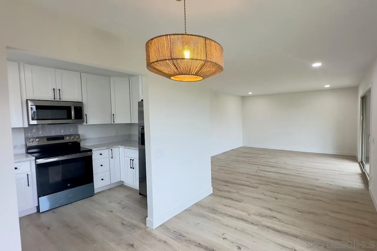 4529 Kittiwake Way Oceanside, CA 92057 - Photo 11 of 23 a view of kitchen with microwave and cabinets