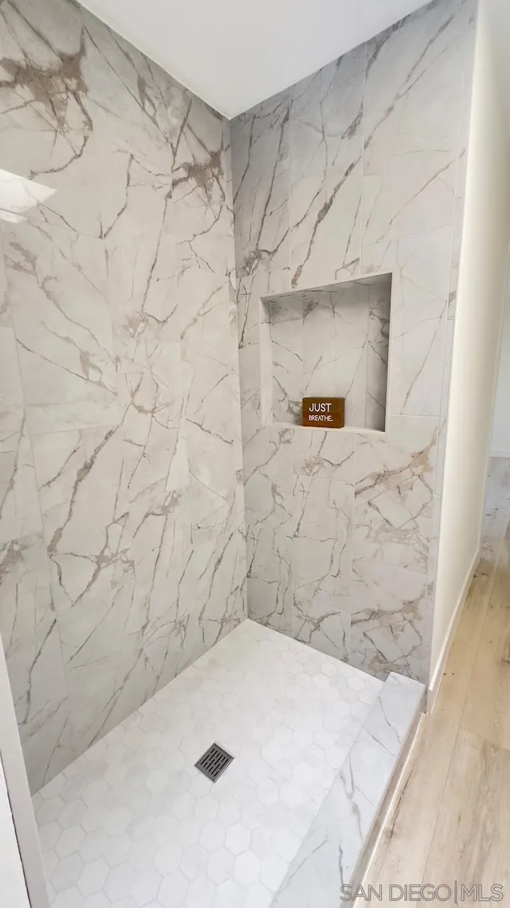 4529 Kittiwake Way Oceanside, CA 92057 - Photo 16 of 23 a bathroom with a shower