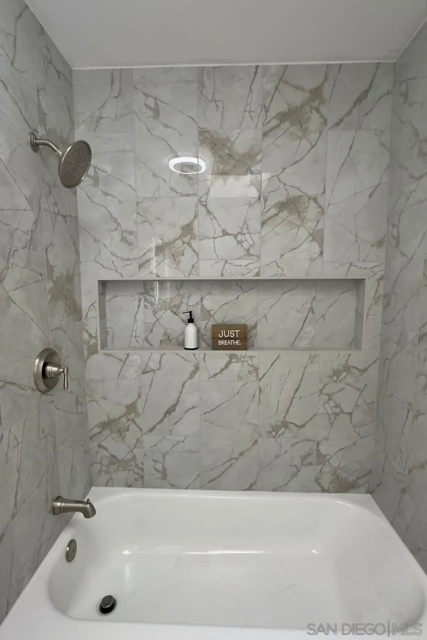 4529 Kittiwake Way Oceanside, CA 92057 - Photo 18 of 23 a bathroom with a bathtub