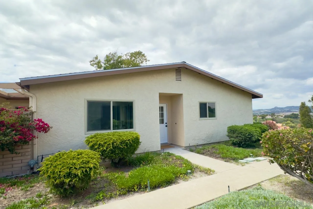 4529 Kittiwake Way Oceanside, CA 92057 - Photo 2 of 23 a view of a house with a small yard