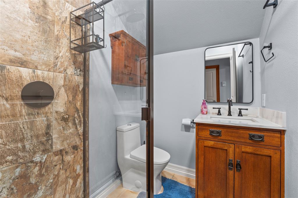 4451 Shiloh Road Midlothian, TX 76065 - Photo 26 of 39 Full bathroom upstairs in bonus room.