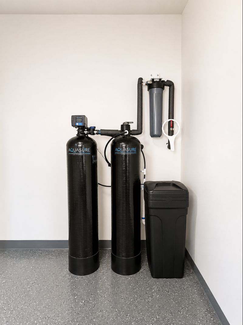 693 Durian Loop Buda, TX 78610 - Photo 23 of 27 Essential water softener system ensures clean water for the entire home.