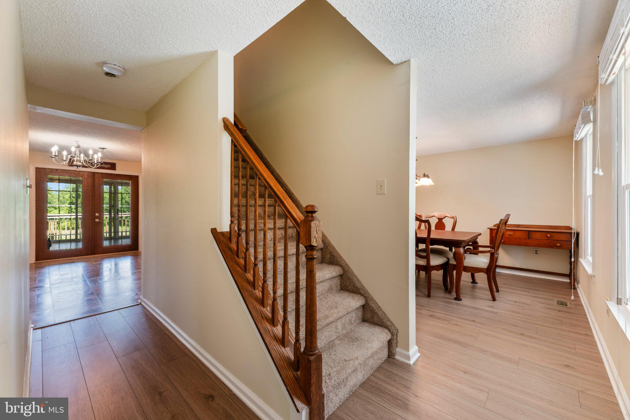 607 Chesterfield Arneytown Road Chesterfield, NJ 08515 - Photo 5 of 57 Inviting entryway with elegant staircase.