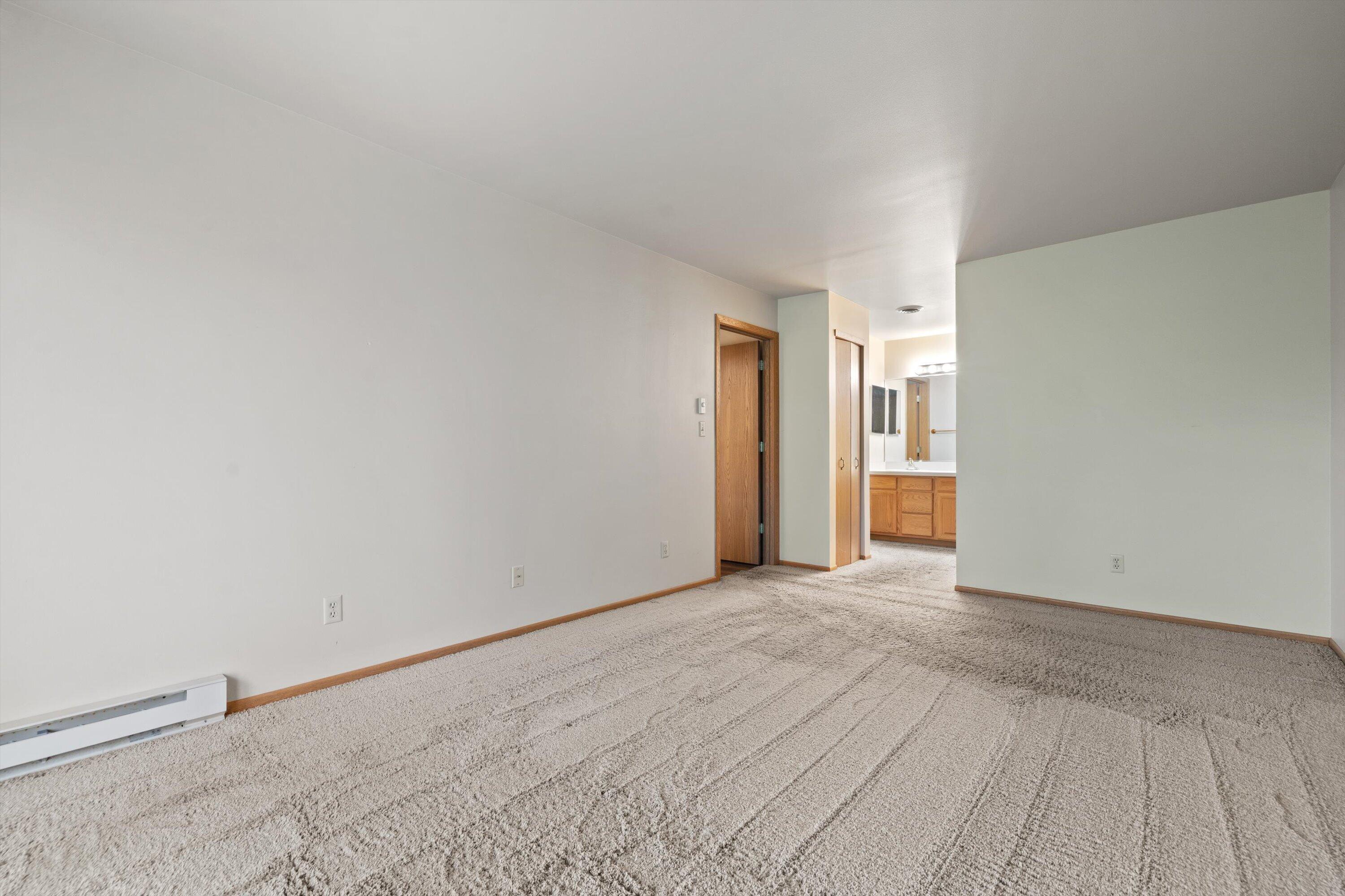 3120 Wood Road, Unit 13F Mount Pleasant, WI 53406 - Photo 19 of 34 primary bedroom