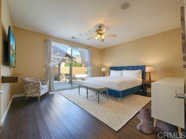 80596 Key Largo Avenue Indio, CA 92201 - Photo 13 of 59 a living room with furniture and a wooden floor
