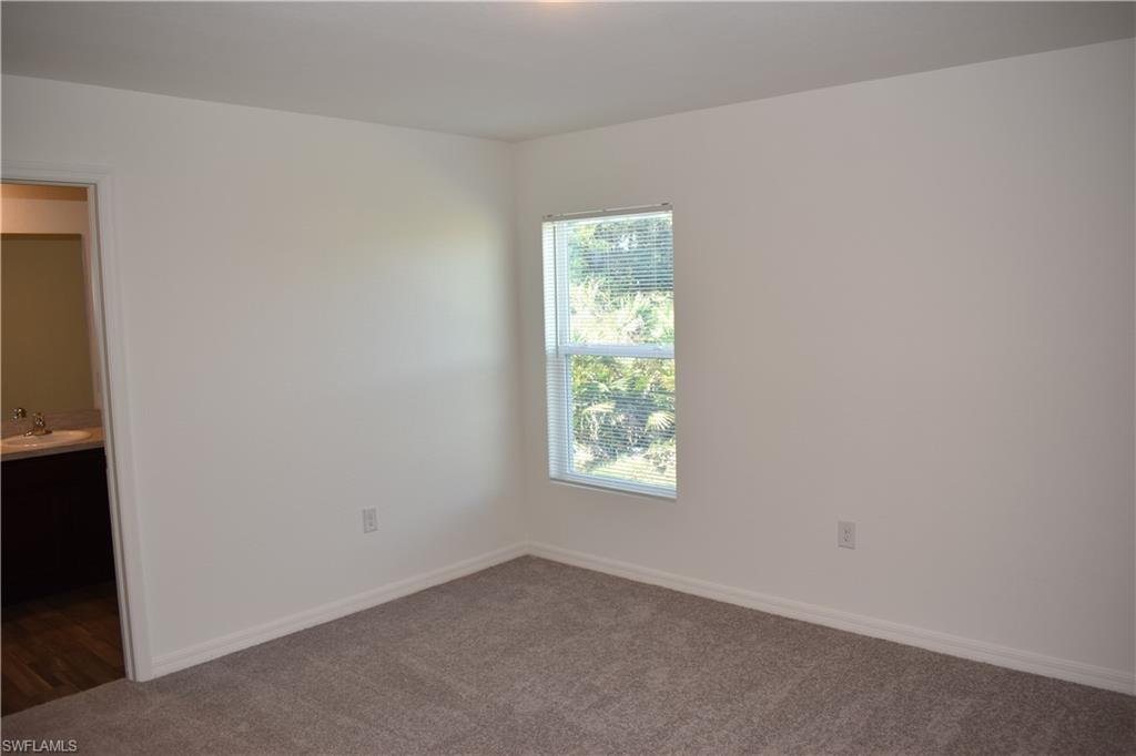 8388 Delong Avenue North Port, FL 34291 - Photo 14 of 21 an empty room with windows