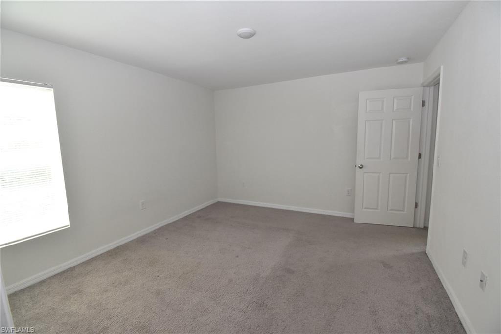 8388 Delong Avenue North Port, FL 34291 - Photo 16 of 21 an empty room with a window