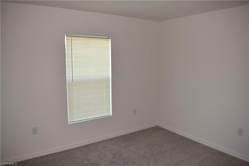 8388 Delong Avenue North Port, FL 34291 - Photo 19 of 21 an empty room with a window