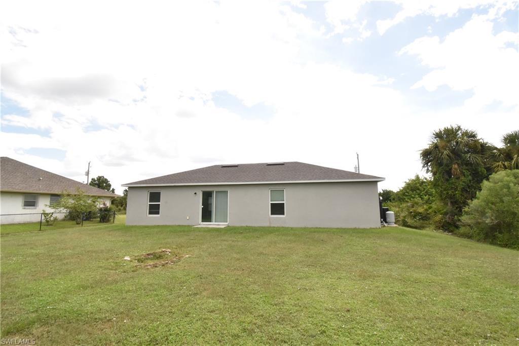 8388 Delong Avenue North Port, FL 34291 - Photo 9 of 21 a view of a house with a backyard