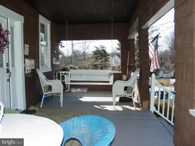 6011 Sycamore Road Baltimore, MD 21212 - Photo 18 of 25 Covered front porch w/ low maint. decking.