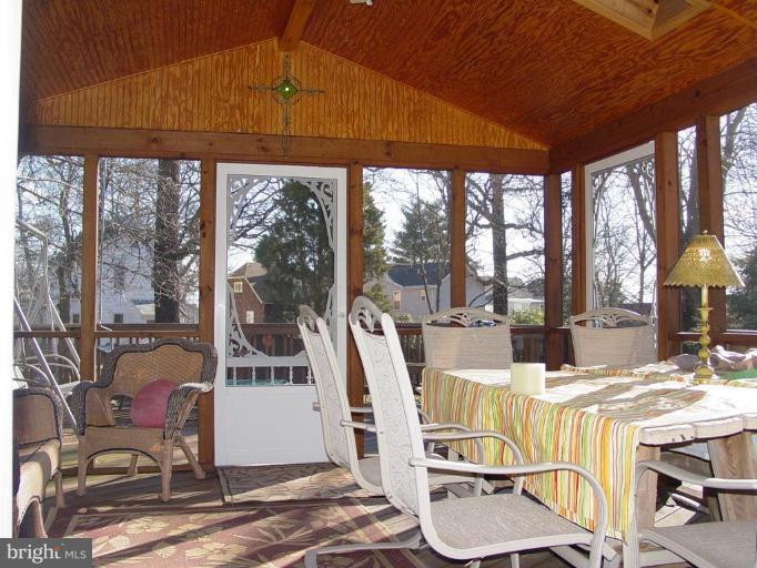 screened porch off family rm. Deck off porch.