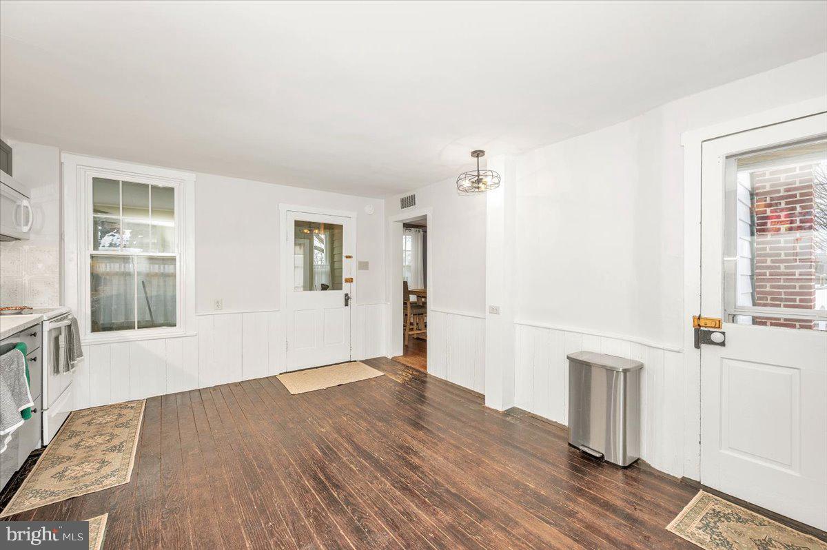 30 Tillie Town Road Biglerville, PA 17307 - Photo 12 of 44 an empty room with wooden floor and windows