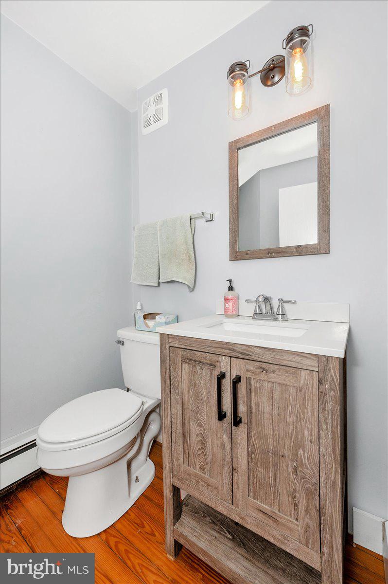 30 Tillie Town Road Biglerville, PA 17307 - Photo 16 of 44 a bathroom with a sink mirror vanity and toilet