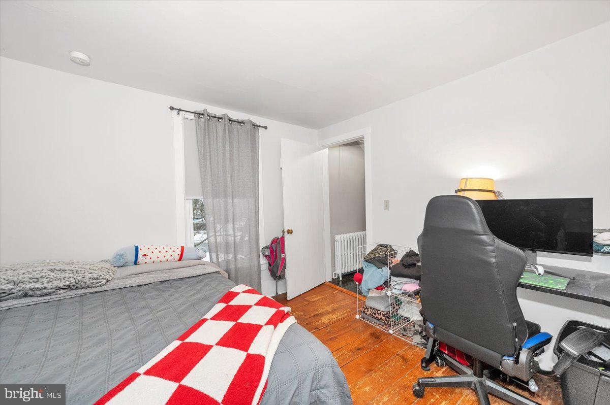 30 Tillie Town Road Biglerville, PA 17307 - Photo 20 of 44 a bedroom with a bed and wooden floor