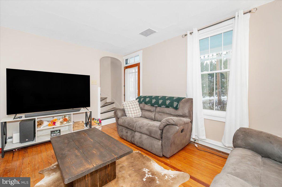 30 Tillie Town Road Biglerville, PA 17307 - Photo 2 of 44 a living room with furniture and a flat screen tv