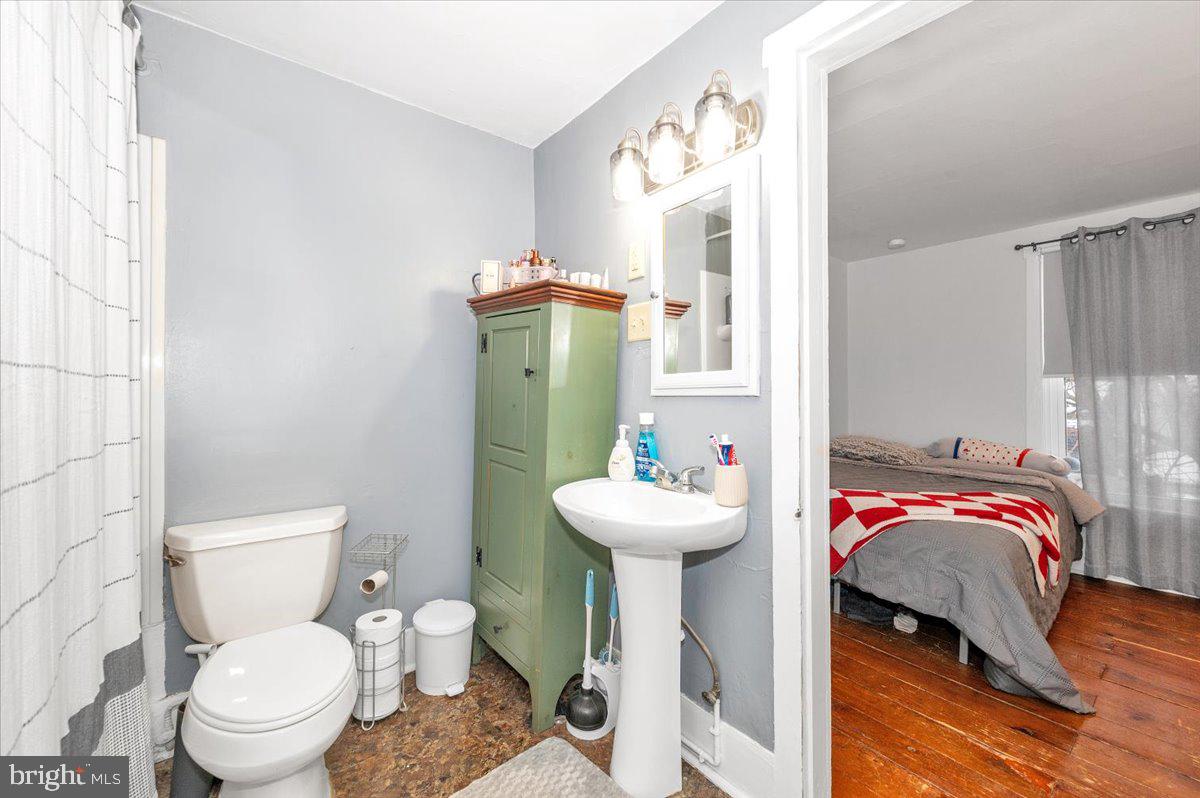 30 Tillie Town Road Biglerville, PA 17307 - Photo 23 of 44 a bathroom with a sink toilet and a mirror