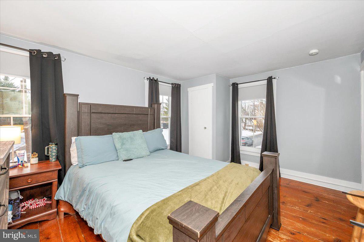 30 Tillie Town Road Biglerville, PA 17307 - Photo 24 of 44 a bedroom with a bed and wooden floor