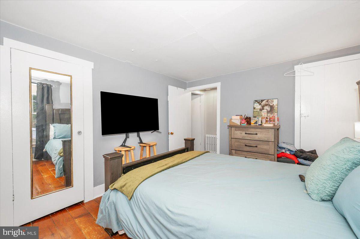 30 Tillie Town Road Biglerville, PA 17307 - Photo 25 of 44 a bedroom with a bed and a flat screen tv