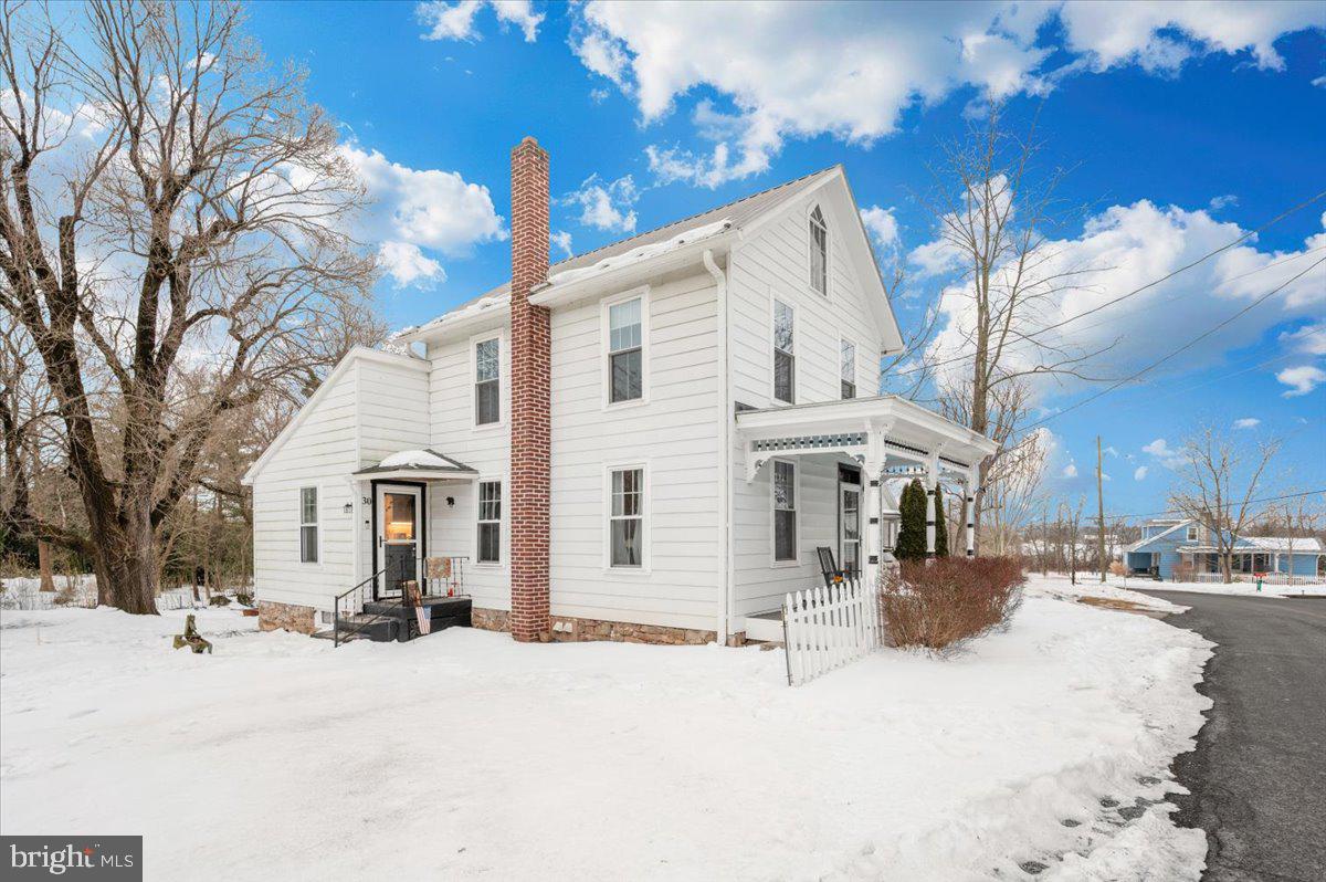 30 Tillie Town Road Biglerville, PA 17307 - Photo 41 of 44 a view of a white house with a yard covered in snow