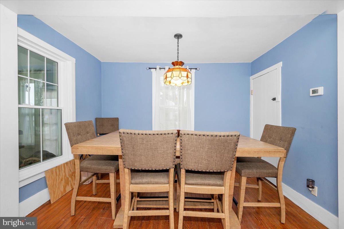 30 Tillie Town Road Biglerville, PA 17307 - Photo 7 of 44 a view of a dining room with furniture window and wooden floor