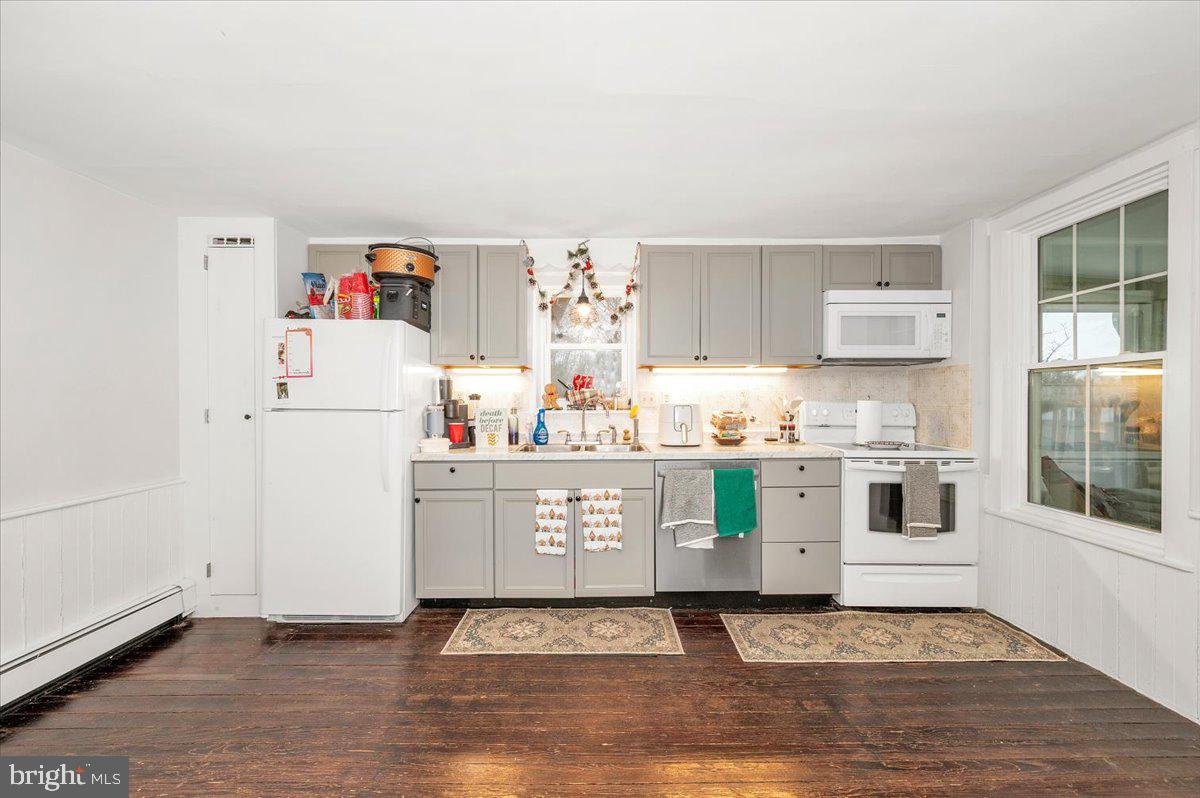 30 Tillie Town Road Biglerville, PA 17307 - Photo 9 of 44 a view of kitchen with stainless steel appliances granite countertop a stove a sink and a refrigerator