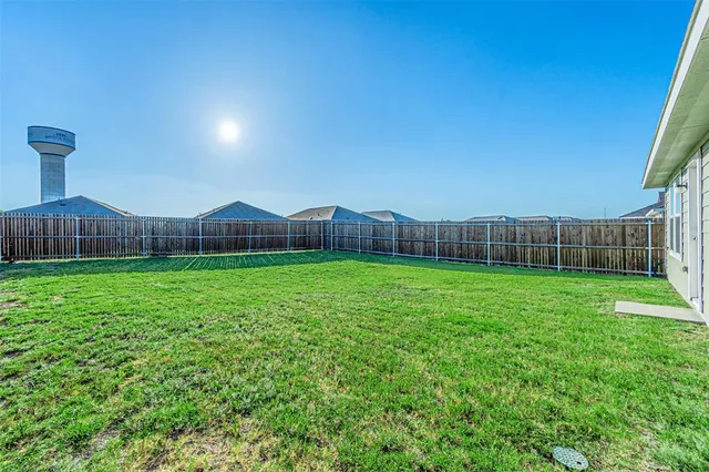 a view of a garden with a space