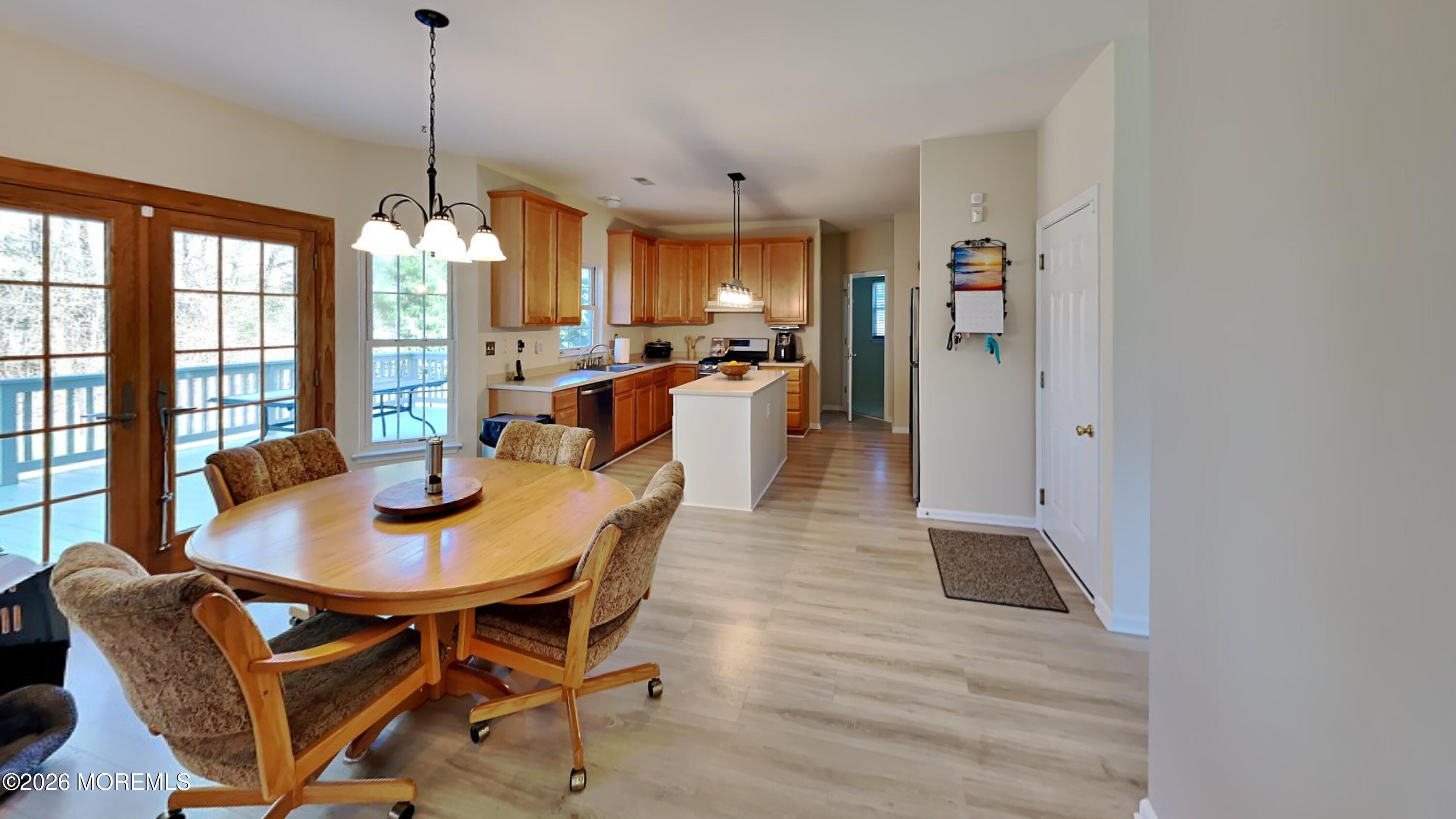 33 Mill Pond Road Jackson, NJ 08527 - Photo 24 of 49 a view of a dining room with furniture window and outside view