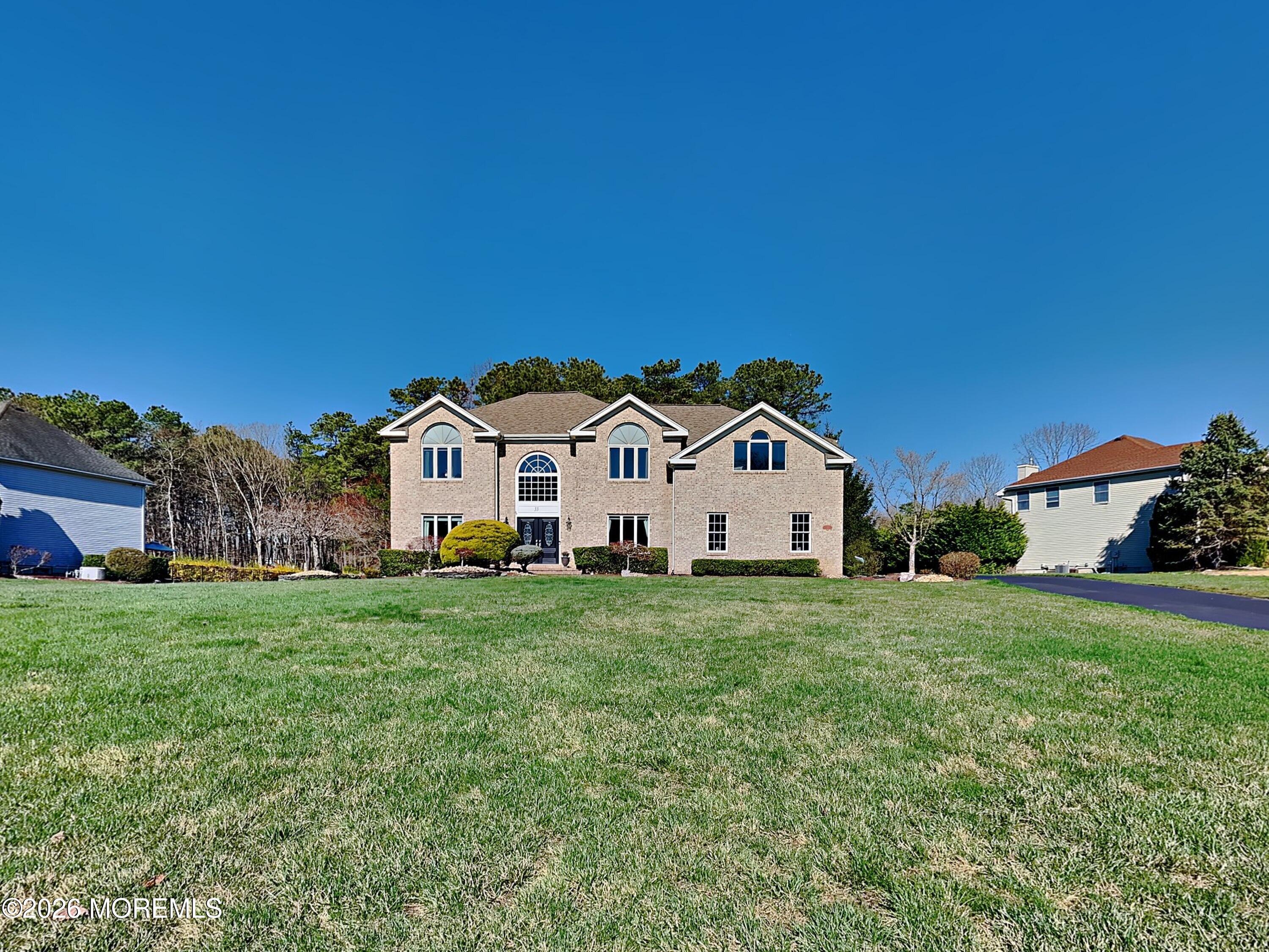 33 Mill Pond Road Jackson, NJ 08527 - Photo 43 of 49 a view of a house with a yard