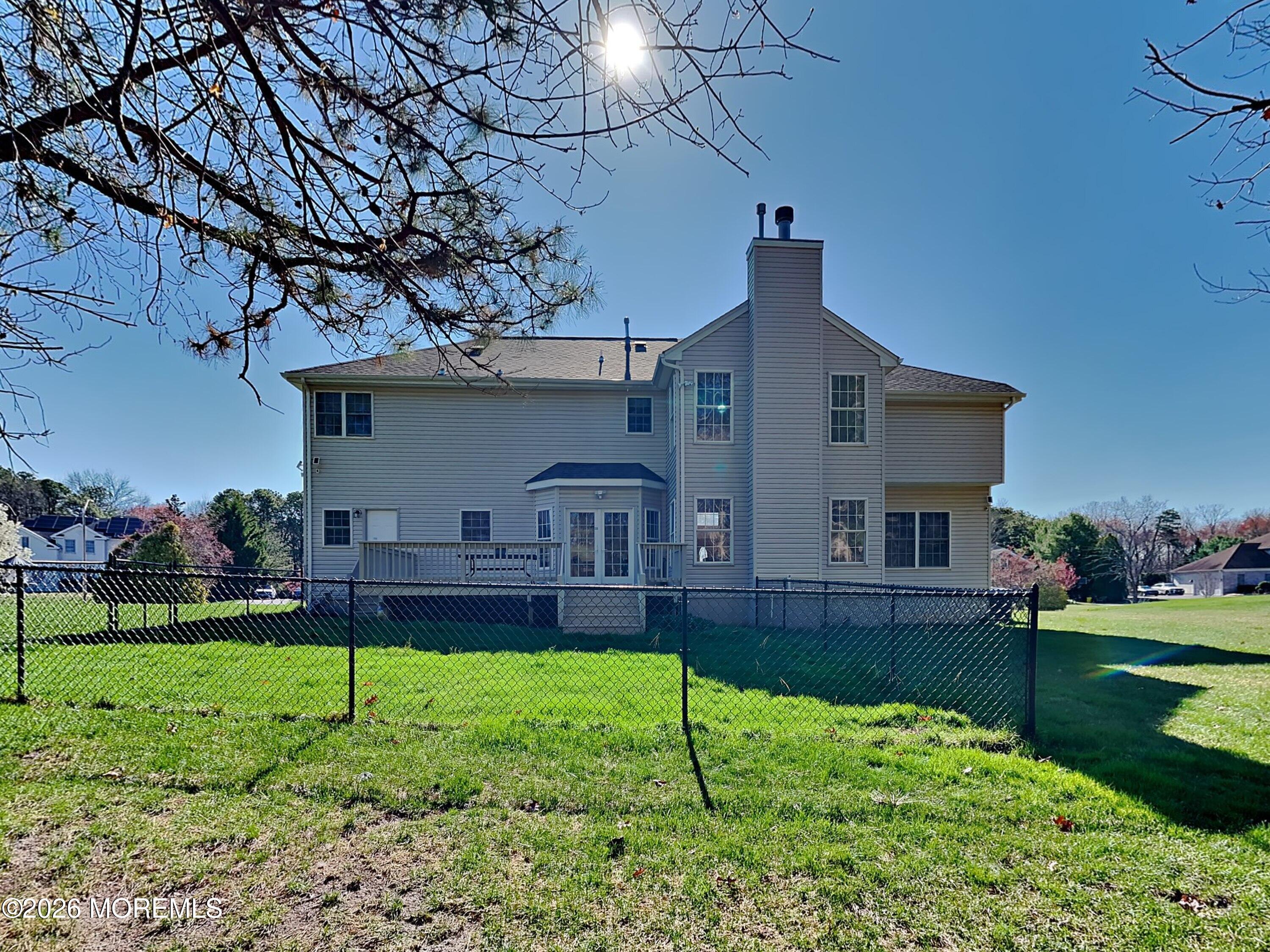 33 Mill Pond Road Jackson, NJ 08527 - Photo 44 of 49 a front view of a house with garden