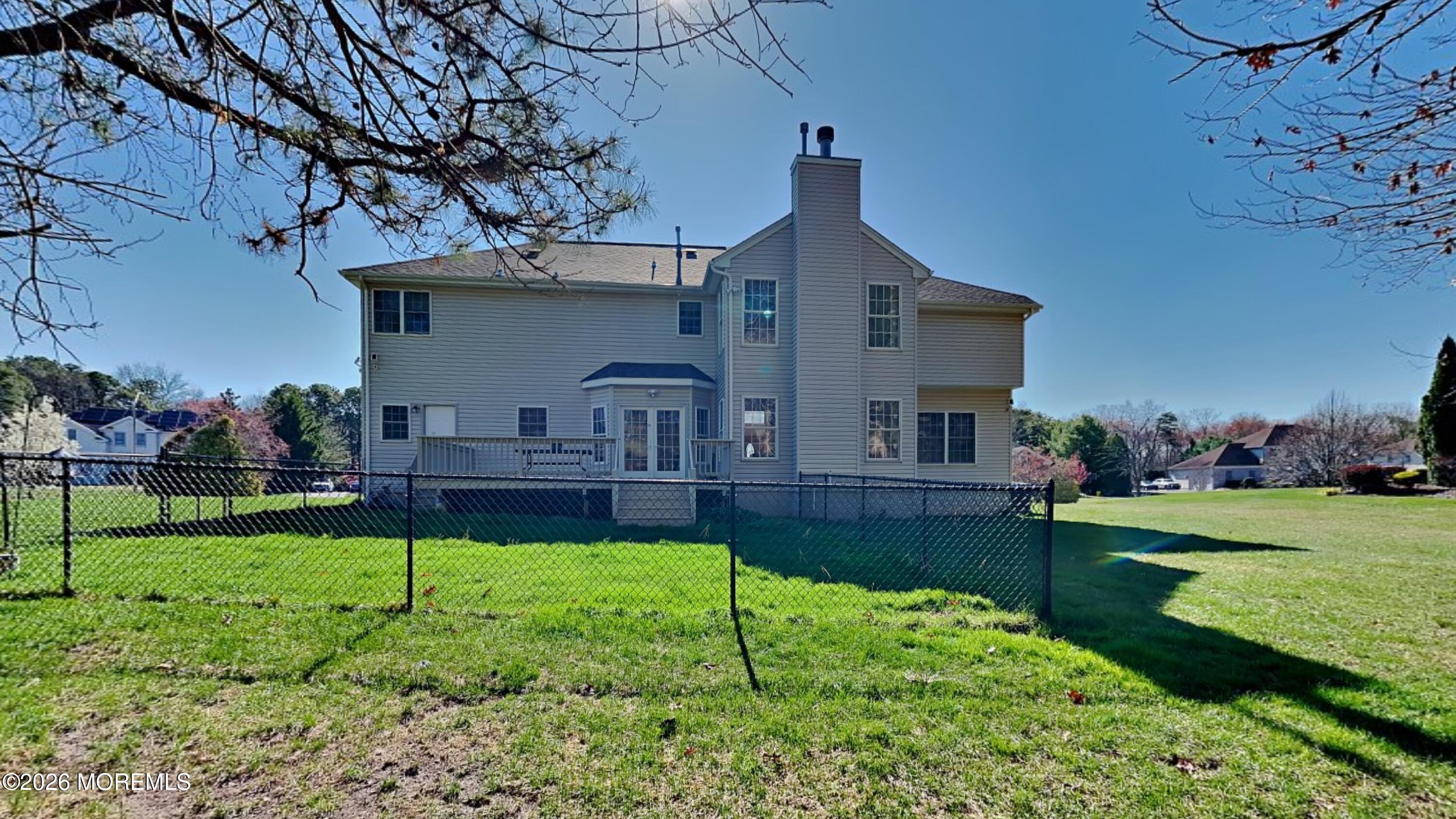33 Mill Pond Road Jackson, NJ 08527 - Photo 46 of 49 a front view of a house with a yard