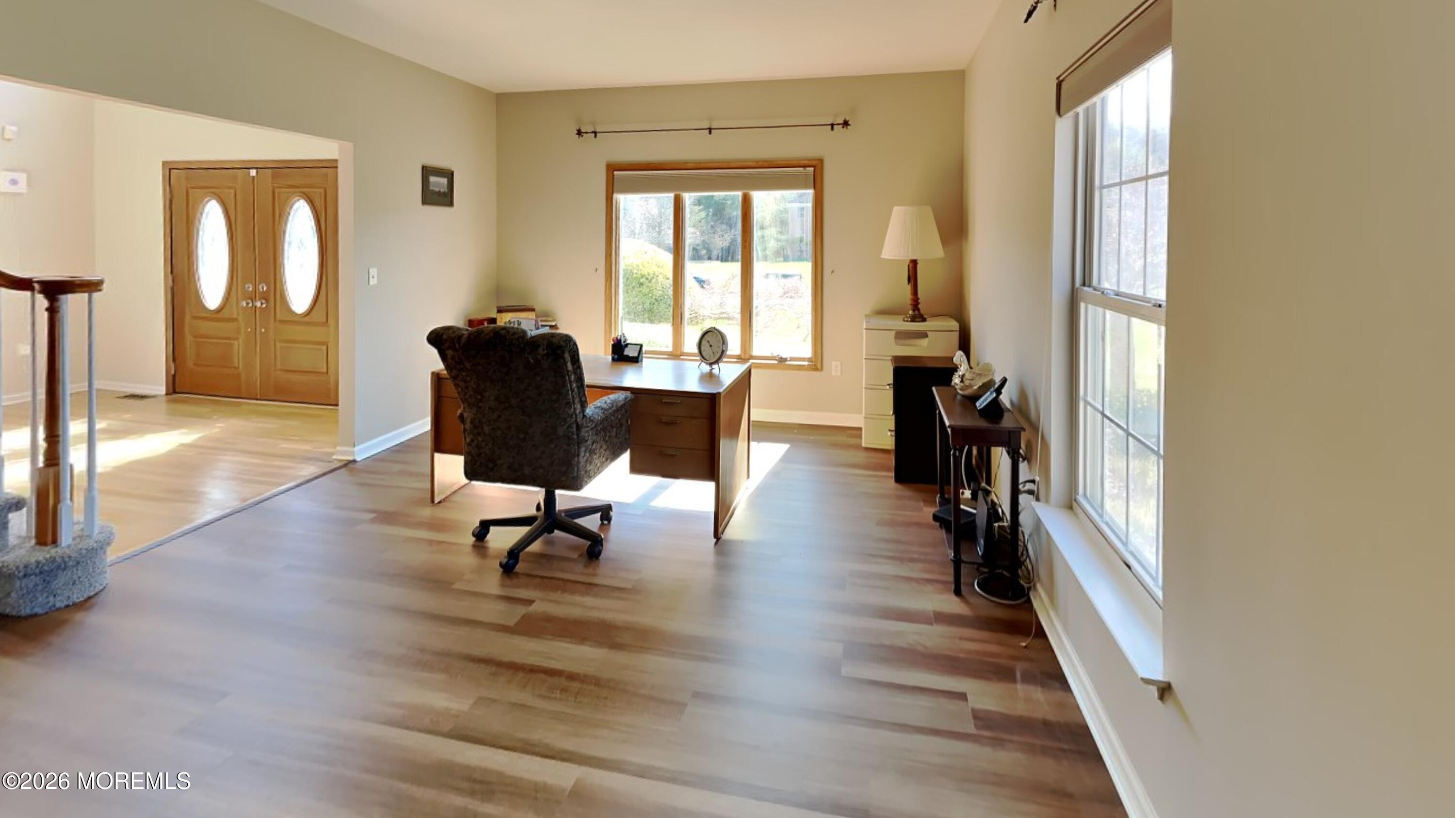 33 Mill Pond Road Jackson, NJ 08527 - Photo 8 of 49 a living room with furniture and a window