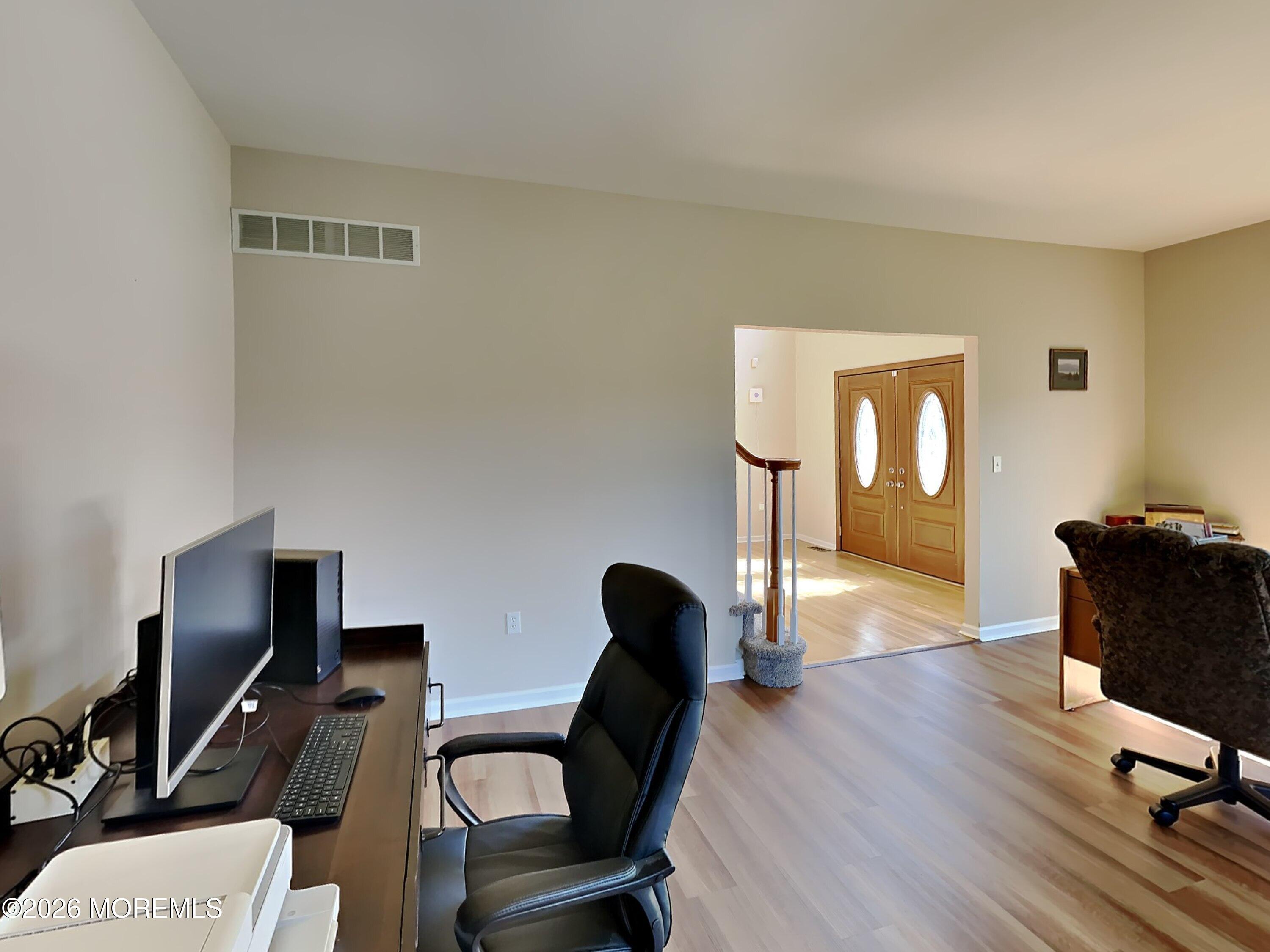 33 Mill Pond Road Jackson, NJ 08527 - Photo 9 of 49 a view of a workspace with furniture and a window