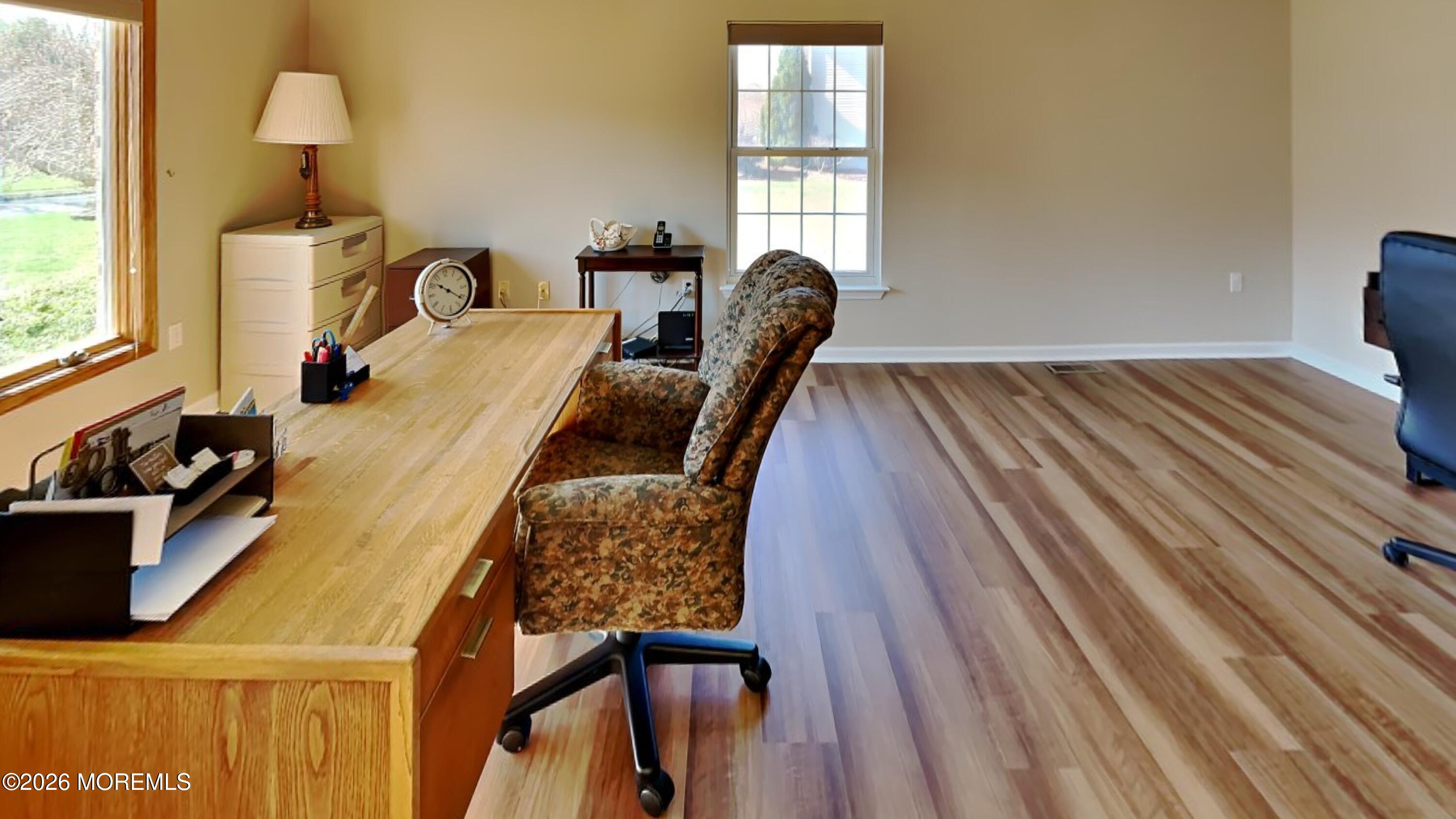 33 Mill Pond Road Jackson, NJ 08527 - Photo 10 of 49 a dining room with furniture and a window