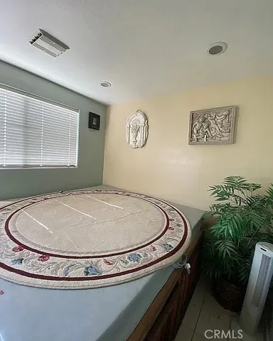 a view of entryway with kitchen