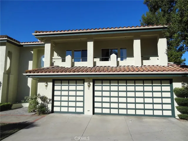 a view of a house with a balcony