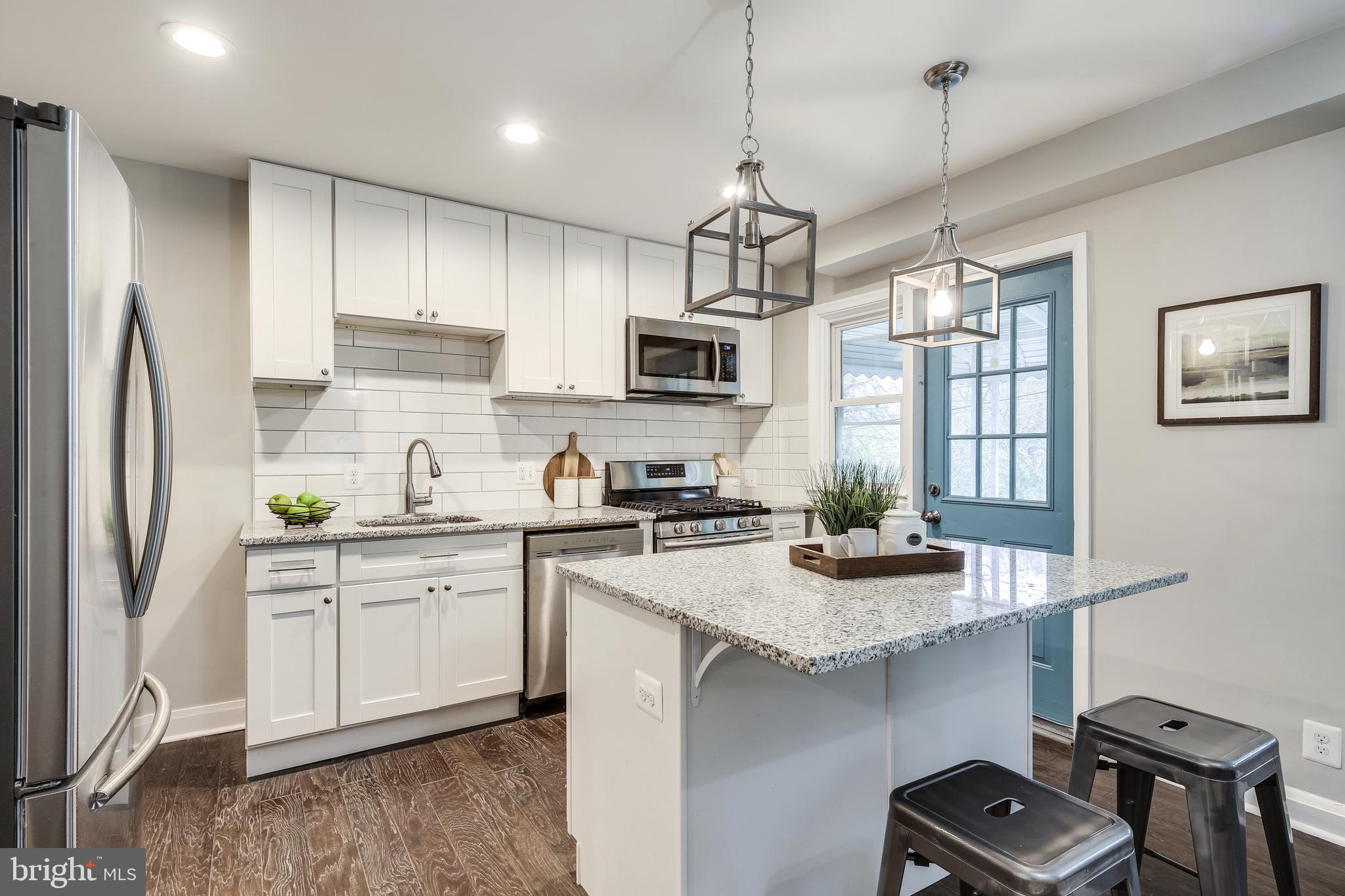 724 Wicklow Road Baltimore, MD 21229 - Photo 2 of 28 Remodeled Kitchen With Center Island
