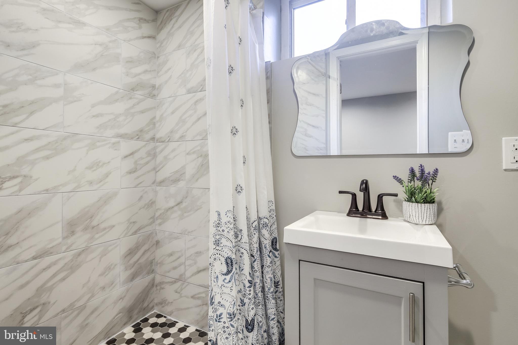 724 Wicklow Road Baltimore, MD 21229 - Photo 21 of 28 Full Basement Bath With Ceramic