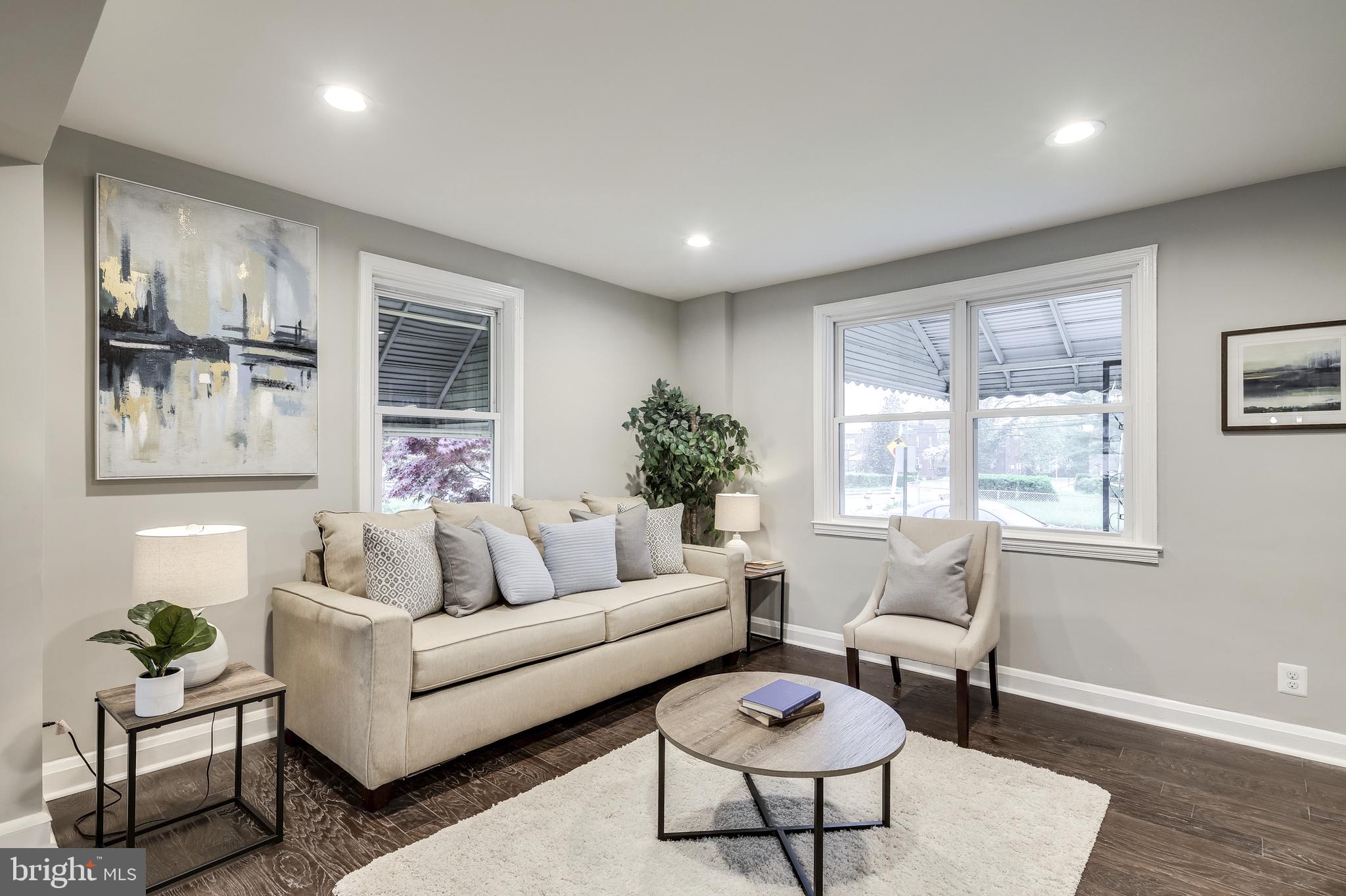 724 Wicklow Road Baltimore, MD 21229 - Photo 8 of 28 Living Room With New Windows