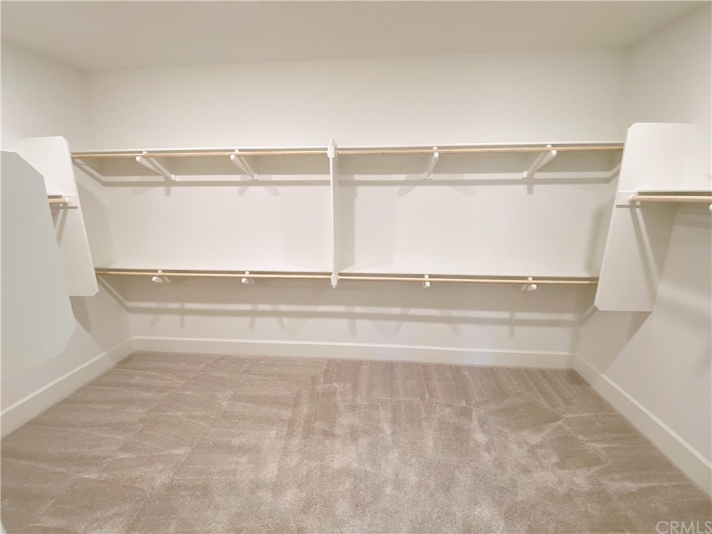 85 Rockinghorse Irvine, CA 92602 - Photo 23 of 33 Walk in closet of master bedroom