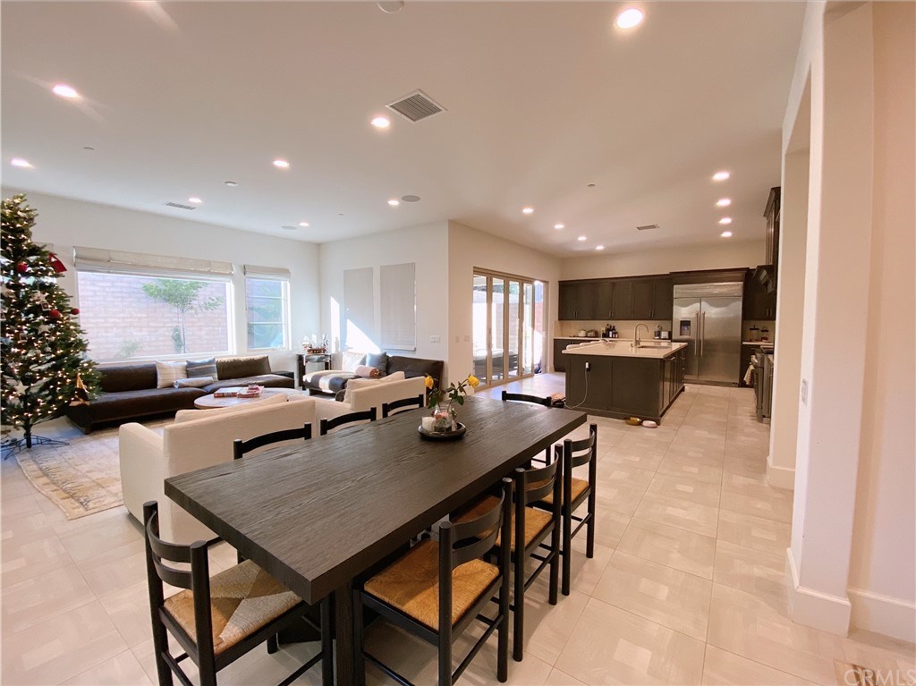 85 Rockinghorse Irvine, CA 92602 - Photo 7 of 33 Overview of living room, dining area and kitchen area