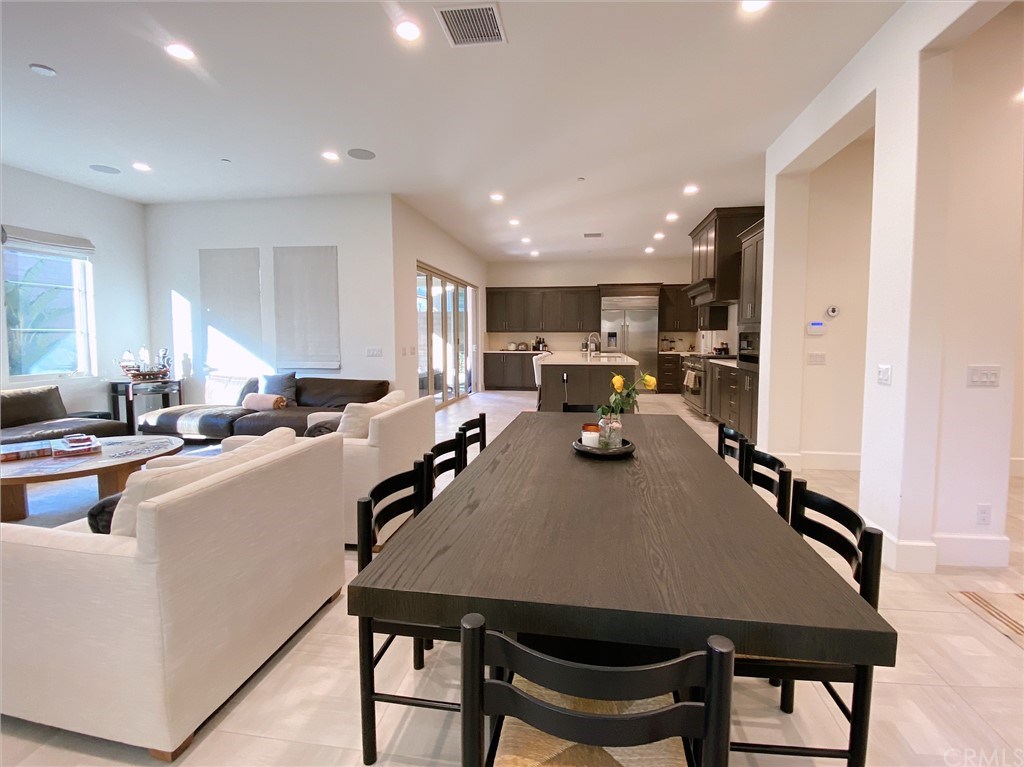 85 Rockinghorse Irvine, CA 92602 - Photo 8 of 33 Overview of living room, dining area, and kitchen area