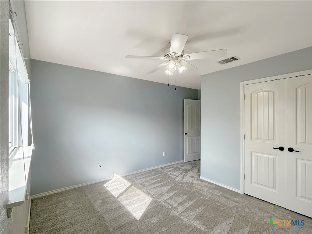 403 Red Hawk Drive Leander, TX 78641 - Photo 26 of 35 a view of an empty room with a window