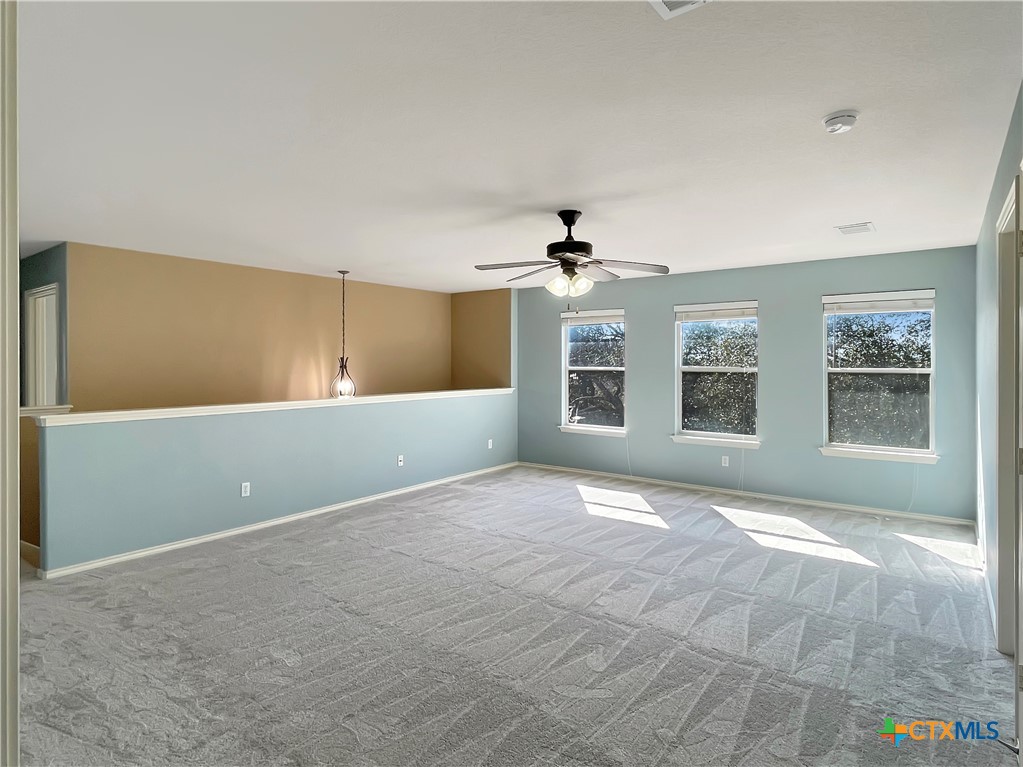 403 Red Hawk Drive Leander, TX 78641 - Photo 33 of 35 a view of an empty room with a window