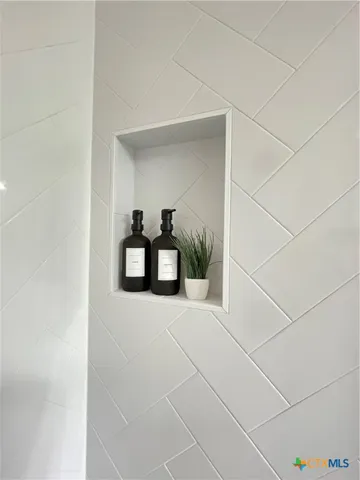 a picture of a bathroom with a sink