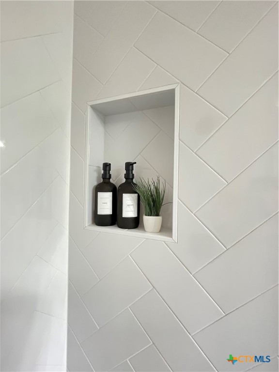 403 Red Hawk Drive Leander, TX 78641 - Photo 9 of 35 a picture of a bathroom with a sink